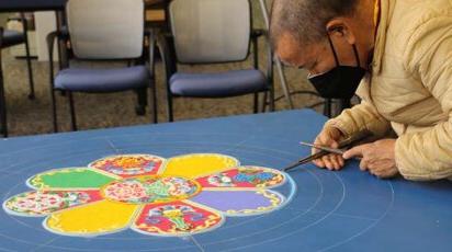 Lama Tenzin creating mandala 2022